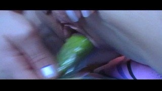 Lonely girl and cucumber