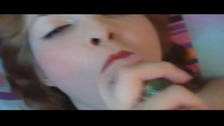 Lonely girl and cucumber