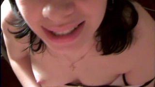 Hot brunette sucks with pleasure in the bathroom