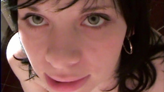 Hot brunette sucks with pleasure in the bathroom