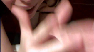 Hot brunette sucks with pleasure in the bathroom